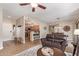 Living room flows into the kitchen and dining room with desert landscaping views at 19700 N 76Th St # 2101, Scottsdale, AZ 85255