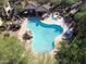Stunning aerial view of a resort-style pool with ample seating and well maintained landscaping at 19700 N 76Th St # 2101, Scottsdale, AZ 85255