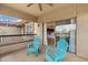 Balcony with views, sliding glass doors, and two blue chairs at 19700 N 76Th St # 2169, Scottsdale, AZ 85255