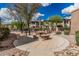 Enjoy the outdoors with a picnic table and community grills on the patio with a view of the lovely two-story building at 19777 N 76Th St # 1131, Scottsdale, AZ 85255