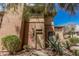 Exterior shot showcasing the front entrance with desert landscaping and a charming facade at 19777 N 76Th St # 1131, Scottsdale, AZ 85255