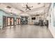 This gym features weights, and machines, providing ample space for a complete workout routine at 19777 N 76Th St # 1131, Scottsdale, AZ 85255