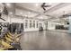 This expansive gym is equipped with stationary bikes, mirrors, and natural light for an invigorating workout at 19777 N 76Th St # 1131, Scottsdale, AZ 85255