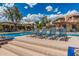 Pool area with lounge chairs and patio seating, perfect for relaxing and enjoying the beautiful desert sunshine at 19777 N 76Th St # 1131, Scottsdale, AZ 85255
