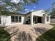 Wide backyard patio with cozy seating area and well-maintained landscaping at 20525 W Hamilton St, Buckeye, AZ 85396