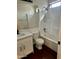 Full bathroom featuring a tub-shower combo, modern vanity, and tile surround at 2074 N 109Th N Ave, Avondale, AZ 85392
