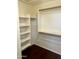 Spacious walk-in closet with custom shelving and ample hanging space for organized storage at 2074 N 109Th N Ave, Avondale, AZ 85392