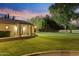 Expansive backyard with lush lawn and patio, perfect for outdoor gatherings and leisure at 2106 E La Vieve Ln, Tempe, AZ 85284