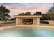 Inviting backyard pool with covered seating area, ideal for outdoor relaxation and leisure at 2106 E La Vieve Ln, Tempe, AZ 85284