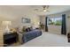 Bedroom with a daybed, window with drapes, and side table at 2106 E La Vieve Ln, Tempe, AZ 85284