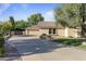 Wide driveway leading to a spacious home with well-manicured landscaping at 2106 E La Vieve Ln, Tempe, AZ 85284