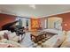 Comfortable living room with grand piano, plush seating, stylish decor, and view to the front entry at 2106 E La Vieve Ln, Tempe, AZ 85284