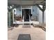 Cozy back porch area perfect for outdoor relaxation and entertaining at 2141 W Elm St, Phoenix, AZ 85015