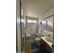 Full bathroom with tiled shower and a vanity at 2141 W Elm St, Phoenix, AZ 85015