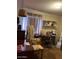 Home office area with desk space, storage, and a window at 2141 W Elm St, Phoenix, AZ 85015