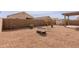 Wide backyard with desert landscaping, block wall, shed and covered patio at 2220 N St Bonita Ln, Casa Grande, AZ 85122