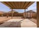 Backyard featuring a covered patio, low maintenance landscaping, and privacy fence at 2220 N St Bonita Ln, Casa Grande, AZ 85122
