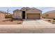 Charming single-story home featuring a well-maintained yard and a two-car garage at 2220 N St Bonita Ln, Casa Grande, AZ 85122