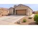 Beautiful single-story home with a two-car garage and desert landscaping at 2220 N St Bonita Ln, Casa Grande, AZ 85122