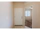 Welcoming foyer with tile flooring and view into a carpeted living space at 2220 N St Bonita Ln, Casa Grande, AZ 85122