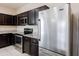 Kitchen with stainless steel appliances and granite countertops at 2220 N St Bonita Ln, Casa Grande, AZ 85122