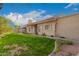 Attractive single-story home with neutral stucco, tile roof, and a well-manicured lawn at 2309 W Shawnee Dr, Chandler, AZ 85224