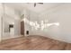 A spacious room with wood flooring and bright natural light at 2309 W Shawnee Dr, Chandler, AZ 85224
