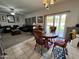 The dining area flows into the living room and has views of the backyard at 2348 W Alta Vista Rd, Phoenix, AZ 85041