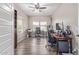 Spacious office featuring wood floors, natural light, dual desks and storage at 2425 E Flintlock Dr, Gilbert, AZ 85298