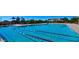 A community swimming pool offers residents a refreshing outdoor activity and a place to socialize at 2425 E Flintlock Dr, Gilbert, AZ 85298
