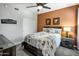 Inviting bedroom with a queen-sized bed, stylish bedding, and coordinated nightstands at 2425 W Bronco Butte Trl # 1056, Phoenix, AZ 85085