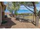 A low maintenance backyard featuring desert landscaping and wrought iron fence at 2701 S Southwind Dr, Gilbert, AZ 85295