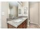 Bright bathroom featuring double sinks, granite counters and decorative mirrors at 2701 S Southwind Dr, Gilbert, AZ 85295