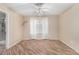 The main bedroom features tile floors, neutral paint, a ceiling fan and a bathroom at 2701 S Southwind Dr, Gilbert, AZ 85295
