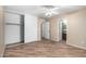 The main bedroom features tile floors, neutral paint and a ceiling fan at 2701 S Southwind Dr, Gilbert, AZ 85295