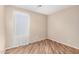 A secondary bedroom featuring tile floors, neutral paint and bright natural light at 2701 S Southwind Dr, Gilbert, AZ 85295