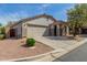 Charming single-level home with a well-manicured yard and two car garage at 2701 S Southwind Dr, Gilbert, AZ 85295