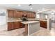 Stylish kitchen boasts granite countertops, a center island, and stainless steel appliances at 2701 S Southwind Dr, Gilbert, AZ 85295