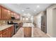 Bright kitchen features a center island, stainless appliances, and seamless flow to living area at 2701 S Southwind Dr, Gilbert, AZ 85295