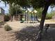 Fun community playground with slides, climbing structures, and a shaded picnic area at 2701 S Southwind Dr, Gilbert, AZ 85295