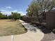 Scenic community walking path surrounded by lush trees and well-maintained landscaping at 2701 S Southwind Dr, Gilbert, AZ 85295