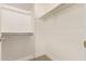 Bright closet with shelving and rod for hanging clothes at 2792 N Acacia Way, Buckeye, AZ 85396