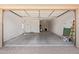 Spacious two-car garage featuring an automatic door, storage space and interior entry at 2792 N Acacia Way, Buckeye, AZ 85396