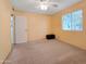 Bedroom featuring carpet floors and natural light at 3108 W Butler Dr, Phoenix, AZ 85051