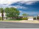 Inviting single-story home with mature landscaping, mature trees, and large driveway at 3108 W Butler Dr, Phoenix, AZ 85051