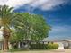 Charming single-story home with lush landscaping and mature trees at 3108 W Butler Dr, Phoenix, AZ 85051