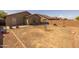 Spacious backyard featuring a brick perimeter, and a small patio at 3122 W Dunbar Dr, Phoenix, AZ 85041