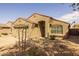 Inviting single-story home with a well-maintained desert landscape and an attached two-car garage at 3122 W Dunbar Dr, Phoenix, AZ 85041