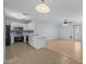 Well-lit open kitchen with stainless steel appliances and eat in dining area at 3122 W Dunbar Dr, Phoenix, AZ 85041