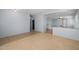 Open-concept living area flowing into a kitchen with views of the outdoor patio at 3122 W Dunbar Dr, Phoenix, AZ 85041